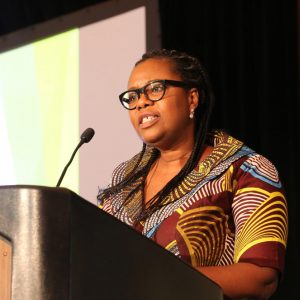 Woman speaking at podium