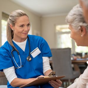 Female doctor talking with her patient
