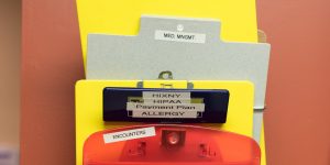 Stacked colorful clipboards