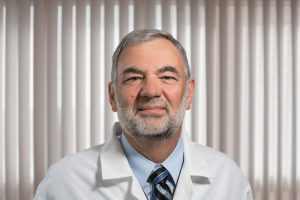 Medical professional smiling at camera