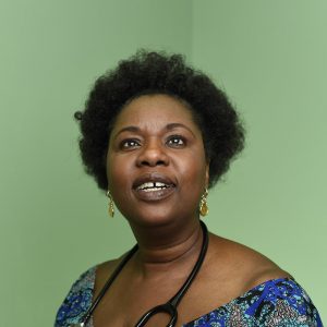 Green background with woman smiling looking up