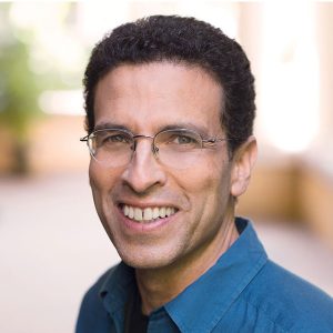 Headshot of man smiling at camera