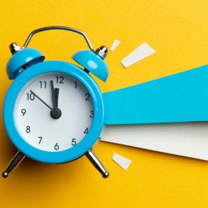 Clock on yellow background
